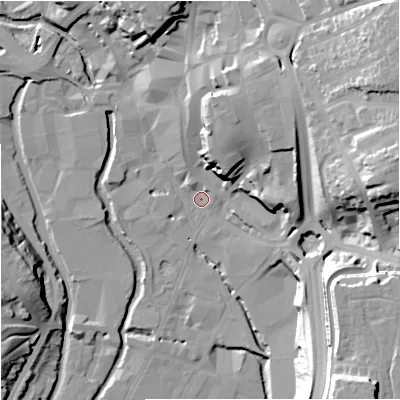 Shaded relief map of the ground around DY101BB, computed from Environment Agency LiDAR. The ground here sits at about 32 m above sea level and falls 37 m across the surrounding 800 m. Surface water reaching this point runs off ground lying to the north-east, 21.1 m higher.