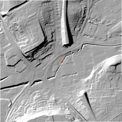 Shaded relief map of the ground around DY101XL, computed from Environment Agency LiDAR. The ground here sits at about 31 m above sea level and falls 34 m across the surrounding 800 m. Surface water reaching this point runs off ground lying to the west-north-west, 24.6 m higher.