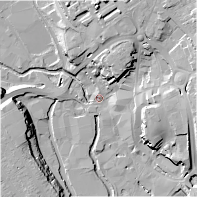 Shaded relief map of the ground around DY102AA, computed from Environment Agency LiDAR. The ground here sits at about 34 m above sea level and falls 25 m across the surrounding 800 m. Surface water reaching this point runs off ground lying to the north-east, 21.3 m higher.