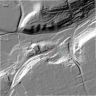 Shaded relief map of the ground around DY102QB, computed from Environment Agency LiDAR. The ground here sits at about 46 m above sea level and falls 35 m across the surrounding 800 m. Surface water reaching this point runs off ground lying to the west, 7.7 m higher.