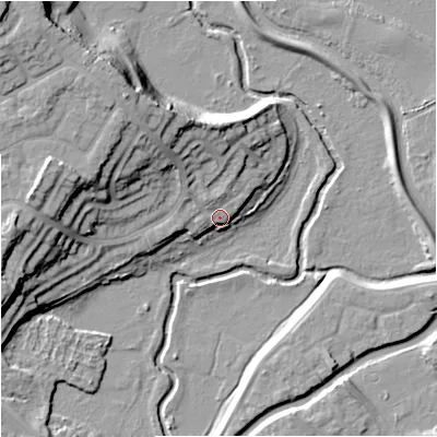 Shaded relief map of the ground around DY115EH, computed from Environment Agency LiDAR. The ground here sits at about 38 m above sea level and falls 23 m across the surrounding 800 m. Surface water reaching this point runs off ground lying to the north-west, 16.3 m higher.