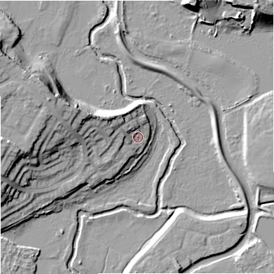 Shaded relief map of the ground around DY115EJ, computed from Environment Agency LiDAR. The ground here sits at about 38 m above sea level and falls 20 m across the surrounding 800 m. Surface water reaching this point runs off ground lying to the west-north-west, 11.4 m higher.