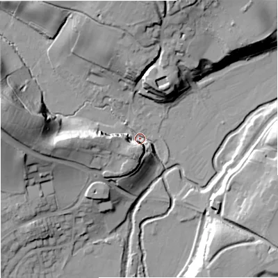 Shaded relief map of the ground around DY115XA, computed from Environment Agency LiDAR. The ground here sits at about 36 m above sea level and falls 40 m across the surrounding 800 m. Surface water reaching this point runs off ground lying to the west-north-west, 38.8 m higher.
