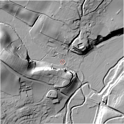 Shaded relief map of the ground around DY115XB, computed from Environment Agency LiDAR. The ground here sits at about 36 m above sea level and falls 40 m across the surrounding 800 m. Surface water reaching this point runs off ground lying to the west, 38.5 m higher.