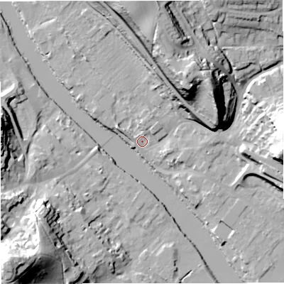Shaded relief map of the ground around DY121AF, computed from Environment Agency LiDAR. The ground here sits at about 21 m above sea level and falls 43 m across the surrounding 800 m. Surface water reaching this point runs off ground lying to the north, 35.7 m higher.