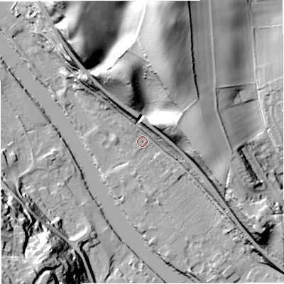 Shaded relief map of the ground around DY121AN, computed from Environment Agency LiDAR. The ground here sits at about 25 m above sea level and falls 51 m across the surrounding 800 m. Surface water reaching this point runs off ground lying to the north-east, 21.7 m higher.