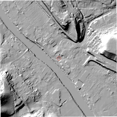Shaded relief map of the ground around DY121BA, computed from Environment Agency LiDAR. The ground here sits at about 21 m above sea level and falls 40 m across the surrounding 800 m. Surface water reaching this point runs off ground lying to the north-east, 4.4 m higher.