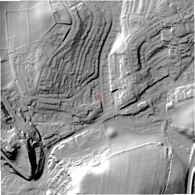 Shaded relief map of the ground around DY121ET, computed from Environment Agency LiDAR. The ground here sits at about 34 m above sea level and falls 35 m across the surrounding 800 m. Surface water reaching this point runs off ground lying to the north-north-west, 21.3 m higher.