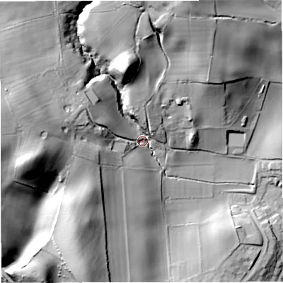 Shaded relief map of the ground around DY121NA, computed from Environment Agency LiDAR. The ground here sits at about 53 m above sea level and falls 52 m across the surrounding 800 m. Surface water reaching this point runs off ground lying to the west-north-west, 33.1 m higher.