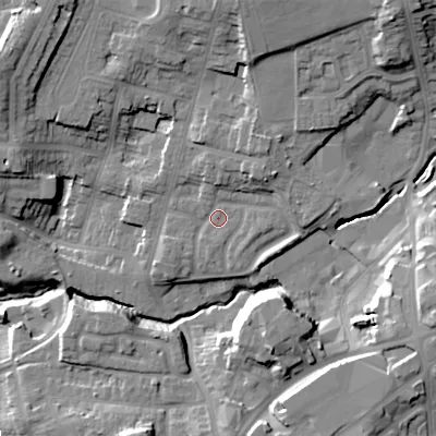 Shaded relief map of the ground around DY20DX, computed from Environment Agency LiDAR. The ground here sits at about 99 m above sea level and falls 25 m across the surrounding 800 m. Surface water reaching this point runs off ground lying to the north-east, 7.0 m higher.