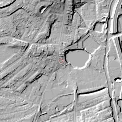 Shaded relief map of the ground around DY40HF, computed from Environment Agency LiDAR. The ground here sits at about 127 m above sea level and falls 25 m across the surrounding 800 m. Surface water reaching this point runs off ground lying to the north, 4.8 m higher.
