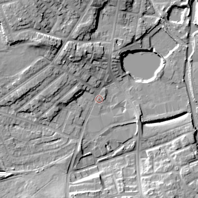 Shaded relief map of the ground around DY40JL, computed from Environment Agency LiDAR. The ground here sits at about 125 m above sea level and falls 17 m across the surrounding 800 m. Surface water reaching this point runs off ground lying to the west, 11.8 m higher.