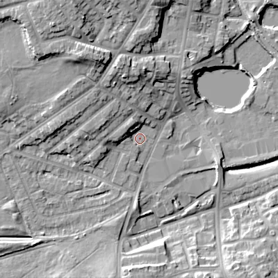 Shaded relief map of the ground around DY40JP, computed from Environment Agency LiDAR. The ground here sits at about 125 m above sea level and falls 17 m across the surrounding 800 m. Surface water reaching this point runs off ground lying to the north-west, 4.7 m higher.