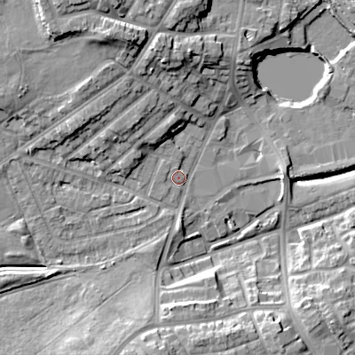 Shaded relief map of the ground around DY40JR, computed from Environment Agency LiDAR. The ground here sits at about 126 m above sea level and falls 17 m across the surrounding 800 m. Surface water reaching this point runs off ground lying to the north-north-west, 12.2 m higher.