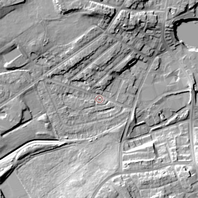 Shaded relief map of the ground around DY40JU, computed from Environment Agency LiDAR. The ground here sits at about 126 m above sea level and falls 17 m across the surrounding 800 m. Surface water reaching this point runs off ground lying to the north, 12.0 m higher.