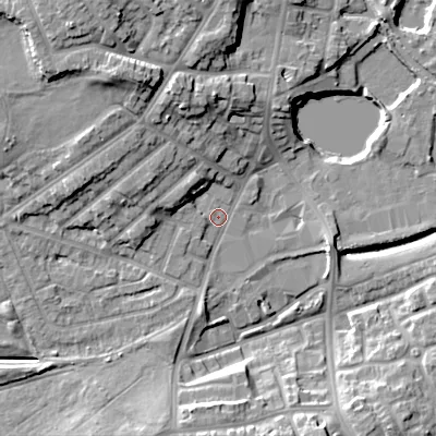 Shaded relief map of the ground around DY40JW, computed from Environment Agency LiDAR. The ground here sits at about 125 m above sea level and falls 17 m across the surrounding 800 m. Surface water reaching this point runs off ground lying to the west-north-west, 7.8 m higher.