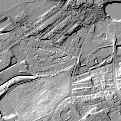 Shaded relief map of the ground around DY40JY, computed from Environment Agency LiDAR. The ground here sits at about 126 m above sea level and falls 17 m across the surrounding 800 m. Surface water reaching this point runs off ground lying to the south-south-west, 10.3 m higher.