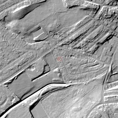 Shaded relief map of the ground around DY40LA, computed from Environment Agency LiDAR. The ground here sits at about 127 m above sea level and falls 14 m across the surrounding 800 m. Surface water reaching this point runs off ground lying to the north-west, 10.5 m higher.