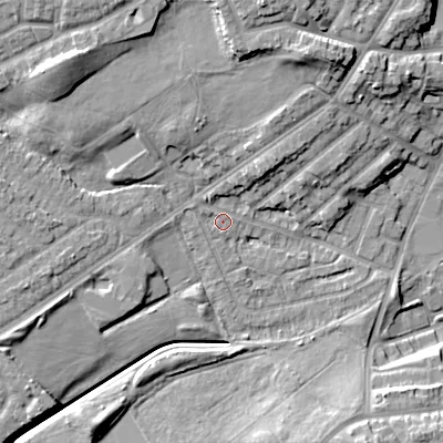 Shaded relief map of the ground around DY40LB, computed from Environment Agency LiDAR. The ground here sits at about 127 m above sea level and falls 15 m across the surrounding 800 m. Surface water reaching this point runs off ground lying to the north-north-east, 10.3 m higher.