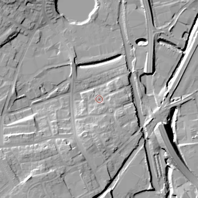 Shaded relief map of the ground around DY40LE, computed from Environment Agency LiDAR. The ground here sits at about 127 m above sea level and falls 18 m across the surrounding 800 m. Surface water reaching this point runs off ground lying to the south, 6.5 m higher.