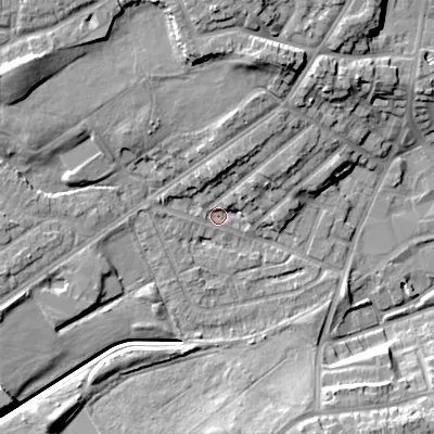 Shaded relief map of the ground around DY40LH, computed from Environment Agency LiDAR. The ground here sits at about 127 m above sea level and falls 15 m across the surrounding 800 m. Surface water reaching this point runs off ground lying to the north-north-east, 10.8 m higher.