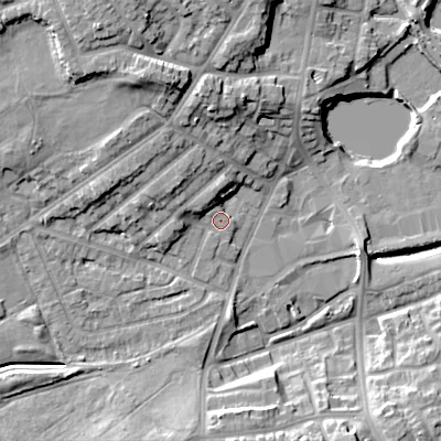 Shaded relief map of the ground around DY40LL, computed from Environment Agency LiDAR. The ground here sits at about 126 m above sea level and falls 17 m across the surrounding 800 m. Surface water reaching this point runs off ground lying to the west-north-west, 3.8 m higher.