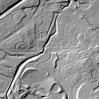 Shaded relief map of the ground around DY47JB, computed from Environment Agency LiDAR. The ground here sits at about 125 m above sea level and falls 15 m across the surrounding 800 m. Surface water reaching this point runs off ground lying to the south-east, 11.5 m higher.