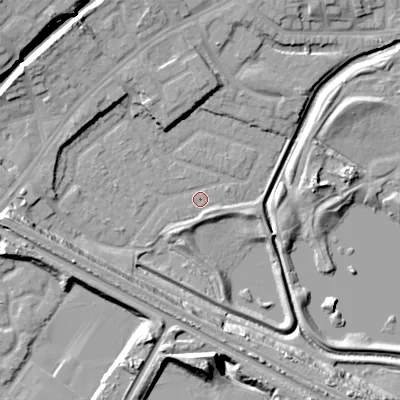 Shaded relief map of the ground around DY47PX, computed from Environment Agency LiDAR. The ground here sits at about 126 m above sea level and falls 21 m across the surrounding 800 m. Surface water reaching this point runs off ground lying to the west, 14.6 m higher.