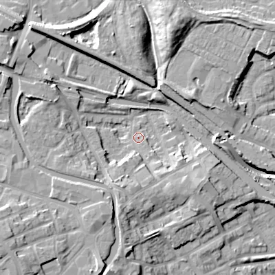 Shaded relief map of the ground around DY49BE, computed from Environment Agency LiDAR. The ground here sits at about 138 m above sea level and falls 17 m across the surrounding 800 m. Surface water reaching this point runs off ground lying to the south-south-west, 9.4 m higher.