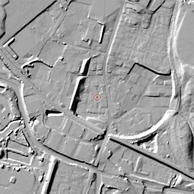 Shaded relief map of the ground around DY49BT, computed from Environment Agency LiDAR. The ground here sits at about 141 m above sea level and falls 16 m across the surrounding 800 m. Surface water reaching this point runs off ground lying to the north-west, 13.0 m higher.