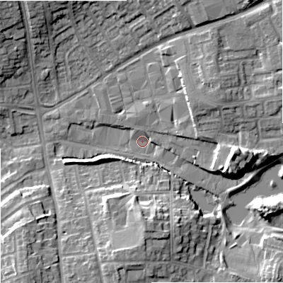 Shaded relief map of the ground around DY67AU, computed from Environment Agency LiDAR. The ground here sits at about 75 m above sea level and falls 13 m across the surrounding 800 m. Surface water reaching this point runs off ground lying to the east-north-east, 7.6 m higher.