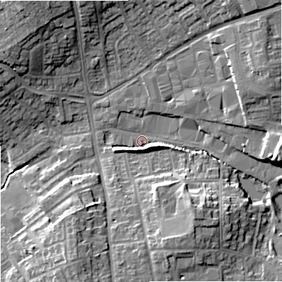 Shaded relief map of the ground around DY67BD, computed from Environment Agency LiDAR. The ground here sits at about 75 m above sea level and falls 14 m across the surrounding 800 m. Surface water reaching this point runs off ground lying to the south-east, 11.6 m higher.