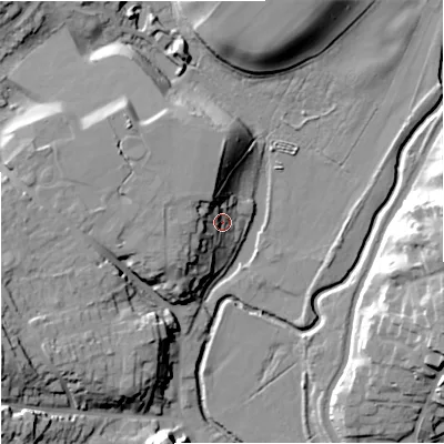 Shaded relief map of the ground around DY76ET, computed from Environment Agency LiDAR. The ground here sits at about 52 m above sea level and falls 25 m across the surrounding 800 m. Surface water reaching this point runs off ground lying to the north-west, 13.2 m higher.