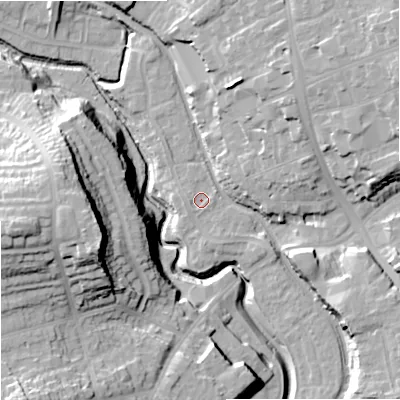 Shaded relief map of the ground around DY84DP, computed from Environment Agency LiDAR. The ground here sits at about 66 m above sea level and falls 36 m across the surrounding 800 m. Surface water reaching this point runs off ground lying to the west, 0.9 m higher.