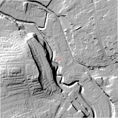 Shaded relief map of the ground around DY84DU, computed from Environment Agency LiDAR. The ground here sits at about 65 m above sea level and falls 36 m across the surrounding 800 m. Surface water reaching this point runs off ground lying to the east-south-east, 3.2 m higher.