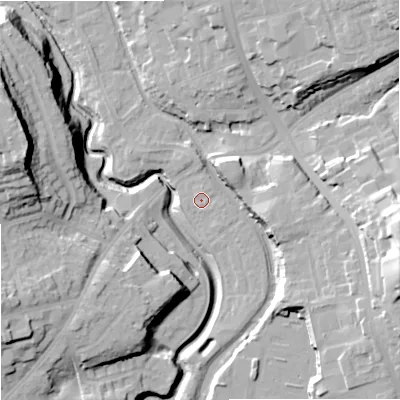Shaded relief map of the ground around DY84GE, computed from Environment Agency LiDAR. The ground here sits at about 65 m above sea level and falls 34 m across the surrounding 800 m. Surface water reaching this point runs off ground lying to the north-east, 1.2 m higher.