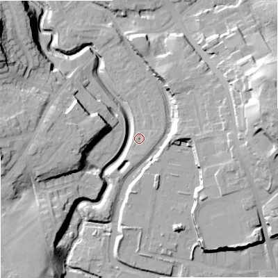 Shaded relief map of the ground around DY84GG, computed from Environment Agency LiDAR. The ground here sits at about 65 m above sea level and falls 33 m across the surrounding 800 m. Surface water reaching this point runs off ground lying to the east-north-east, 1.6 m higher.