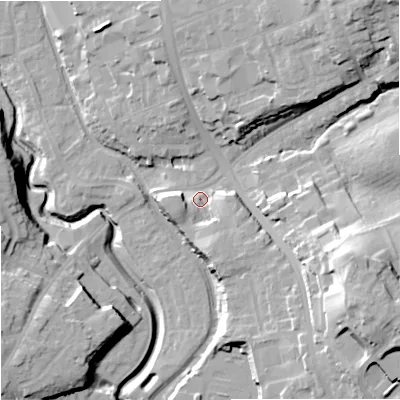 Shaded relief map of the ground around DY84HE, computed from Environment Agency LiDAR. The ground here sits at about 70 m above sea level and falls 33 m across the surrounding 800 m. Surface water reaching this point runs off ground lying to the south-east, 6.8 m higher.