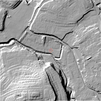 Shaded relief map of the ground around DY84XE, computed from Environment Agency LiDAR. The ground here sits at about 62 m above sea level and falls 36 m across the surrounding 800 m. Surface water reaching this point runs off ground lying to the south, 20.6 m higher.