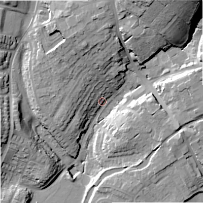 Shaded relief map of the ground around DY85AB, computed from Environment Agency LiDAR. The ground here sits at about 68 m above sea level and falls 40 m across the surrounding 800 m. Surface water reaching this point runs off ground lying to the west-south-west, 21.2 m higher.
