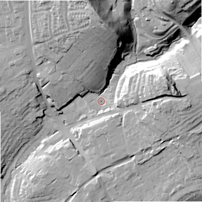 Shaded relief map of the ground around DY85SQ, computed from Environment Agency LiDAR. The ground here sits at about 71 m above sea level and falls 56 m across the surrounding 800 m. Surface water reaching this point runs off ground lying to the east-north-east, 33.0 m higher.