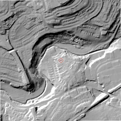 Shaded relief map of the ground around DY97AT, computed from Environment Agency LiDAR. The ground here sits at about 79 m above sea level and falls 55 m across the surrounding 800 m. Surface water reaching this point runs off ground lying to the south-east, 10.3 m higher.