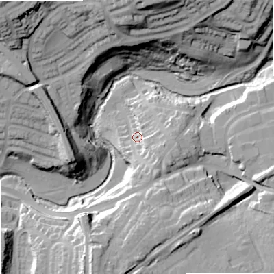 Shaded relief map of the ground around DY97AZ, computed from Environment Agency LiDAR. The ground here sits at about 76 m above sea level and falls 45 m across the surrounding 800 m. Surface water reaching this point runs off ground lying to the south-east, 13.1 m higher.