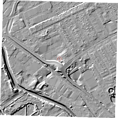 Shaded relief map of the ground around E107FJ, computed from Environment Agency LiDAR. The ground here sits at about 7 m above sea level and falls 11 m across the surrounding 800 m. Surface water reaching this point runs off ground lying to the south-south-east, 3.2 m higher.