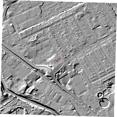 Shaded relief map of the ground around E107FP, computed from Environment Agency LiDAR. The ground here sits at about 7 m above sea level and falls 11 m across the surrounding 800 m. Surface water reaching this point runs off ground lying to the south-south-west, 2.3 m higher.