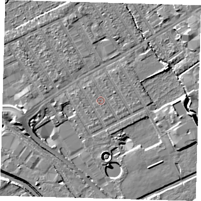 Shaded relief map of the ground around E107LP, computed from Environment Agency LiDAR. The ground here sits at about 6 m above sea level and falls 12 m across the surrounding 800 m. Surface water reaching this point runs off ground lying to the east, 0.7 m higher.