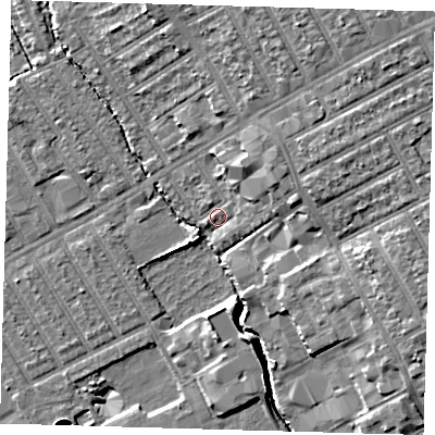 Shaded relief map of the ground around E107LQ, computed from Environment Agency LiDAR. The ground here sits at about 7 m above sea level and falls 15 m across the surrounding 800 m. Surface water reaching this point runs off ground lying to the north-east, 6.7 m higher.