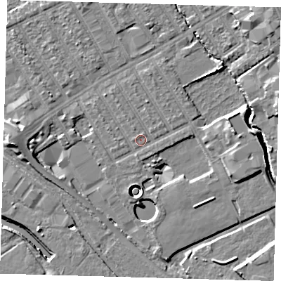 Shaded relief map of the ground around E107LS, computed from Environment Agency LiDAR. The ground here sits at about 6 m above sea level and falls 12 m across the surrounding 800 m. Surface water reaching this point runs off ground lying to the north-north-west, 1.0 m higher.