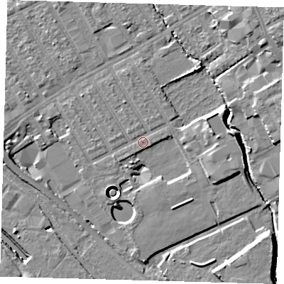 Shaded relief map of the ground around E107LT, computed from Environment Agency LiDAR. The ground here sits at about 7 m above sea level and falls 13 m across the surrounding 800 m. Surface water reaching this point runs off ground lying to the east, 9.3 m higher.