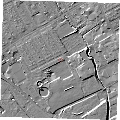 Shaded relief map of the ground around E107LU, computed from Environment Agency LiDAR. The ground here sits at about 7 m above sea level and falls 13 m across the surrounding 800 m. Surface water reaching this point runs off ground lying to the east, 9.3 m higher.